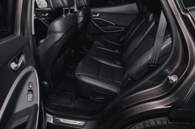 Novosibirsk/ Russia  August 25  2020: Hyundai Santa Fe, Comfort car inside. Clean car interior: black back seats, headrests and belt  clipart