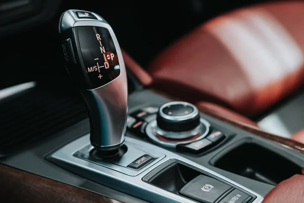 Close-up view of the automatic gearbox lever. Interior car,  automatic transmission gearshift stick;