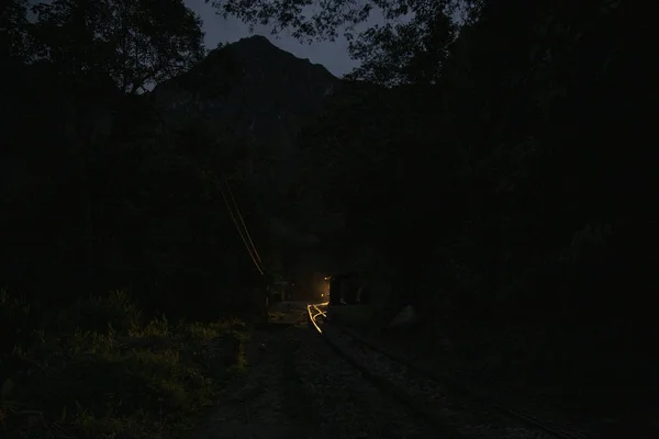 night,train,Hydroelectric route to Aguas Calientes, train tracks,Machu Picchu, Peru