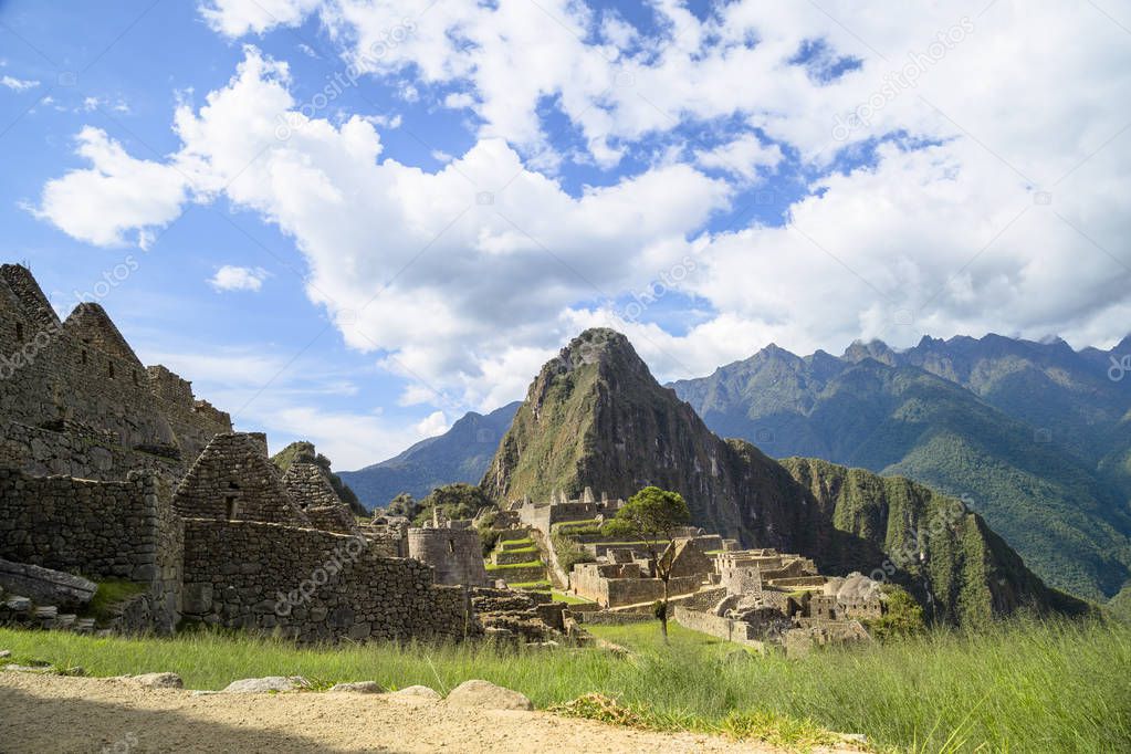 A unique and interesting view of the ancient Inca site of Machu Picchu, nestled high in the Andes Mountains of Peru