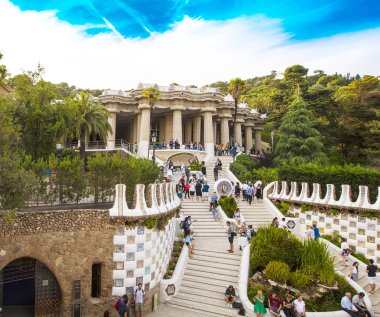 BARCELONA, SPAIN - JUNE 12,2018 : Gorgeous and amazing Park Guel in Barcelona. Park Guell (1914) is the famous architectural town art designed by Antoni Gaudi. Event September 02, 2014 in Barcelona clipart