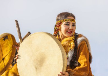 PETROPAVLOVSK, KAMCHATKA, RUSSIA - NOVEMBER 4, 2018: Folk ensemble performance in dress of indigenous people of Kamchatka. The holiday Northern aboriginal Koryak was Hololo. clipart