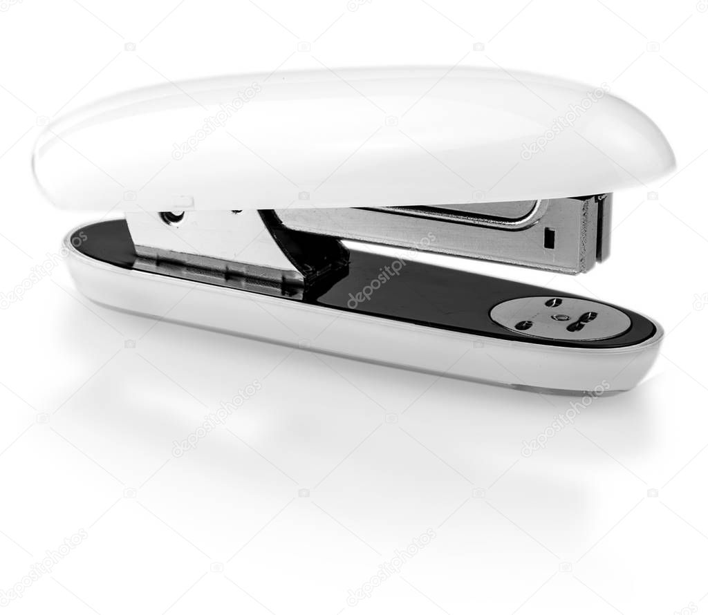 White and metal stapler over a white background
