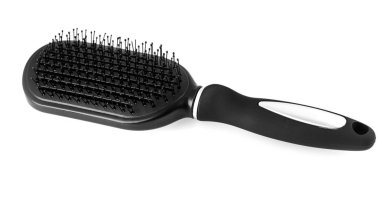 Masaj tarağı. beyaz bir arka plan üzerinde izole