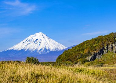 The Panoramic autumn  view of the  Koryaksky Volcano on Kamchatk clipart