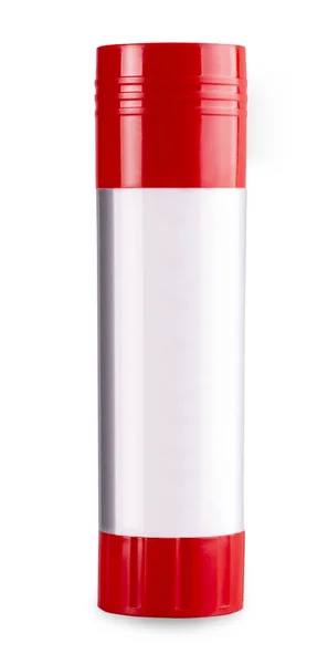 Бумажная клеевая палка с красной кепкой на белом фоне — стоковое фото