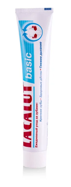 Lacalut memperbaiki dan melindungi pasta gigi pada latar belakang putih , — Stok Foto