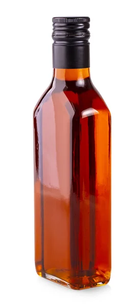 A garrafa de óleo de espinheiro do mar isolado no fundo branco — Fotografia de Stock
