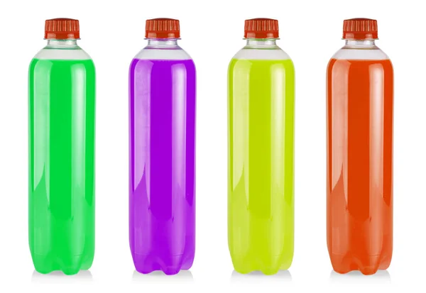 Les bouteilles en plastique avec du jus coloré sur blanc — Photo