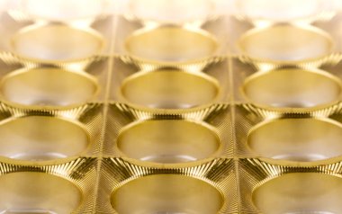 Parlak altın sarısı arka plan içi boş şeker b 'nin dokusu olarak