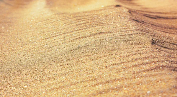 Padrão de areia de uma praia no verão — Fotografia de Stock