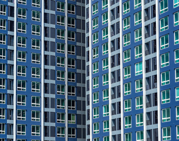 Window grid or window pattern of two condominium.