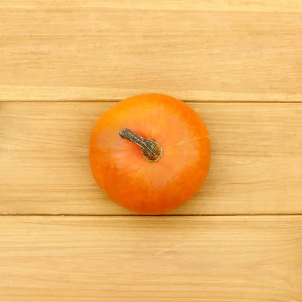 Una Calabaza Naranja Una Superficie Madera Vista Superior Vacaciones Verduras — Foto de Stock