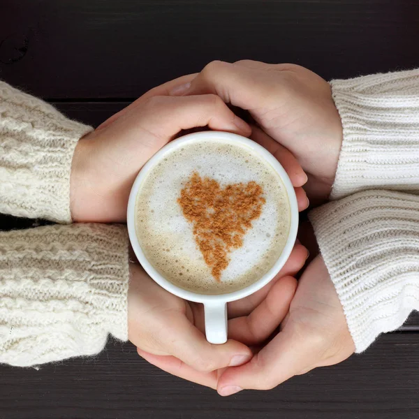 frothy coffee with drawing heart, hands hug love people couple