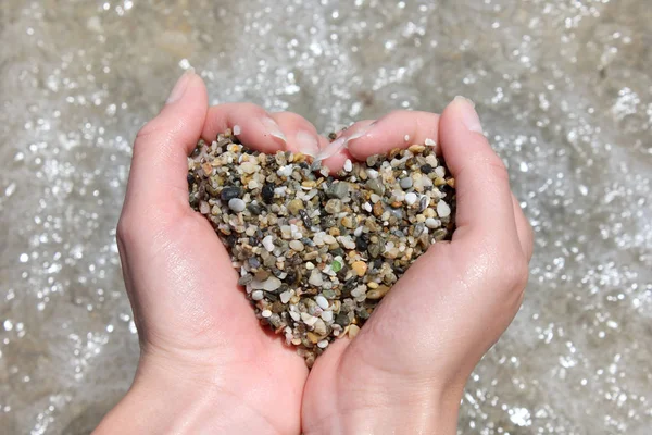 Wet Sea Pebbles Hands Form Heart Symbol Background Water Declaration — Stock Photo, Image