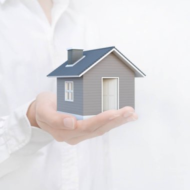 Basit ev insan elinde. Görüntü mimarisi, bina, inşaat, gayrimenkul ve mülkiyet kavramı anlayışı. House 3d render.
