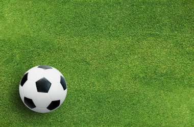 Futbol futbol topu futbol alan arka plan deseni ve doku ile yeşil çimenlerin üzerinde.
