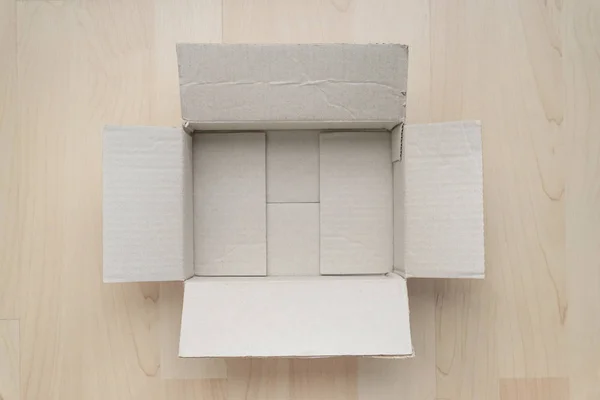 Caja Cartón Rectangular Abierta Vacía Sobre Fondo Madera Compras Línea —  Fotos de Stock