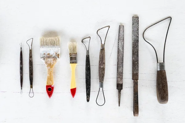 Sculpture tools. Art and craft tools on white background.