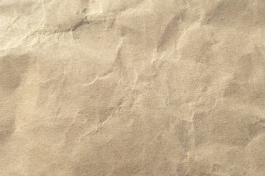 Arkaplan için kahverengi buruşmuş kağıt dokusu.