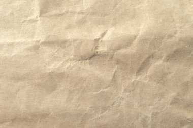 Arkaplan için kahverengi buruşmuş kağıt dokusu.