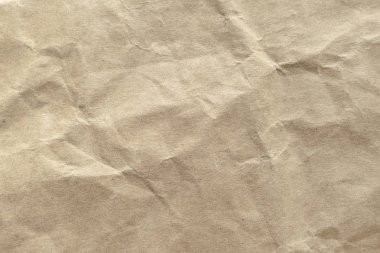 Arkaplan için kahverengi buruşmuş kağıt dokusu.