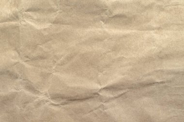Arkaplan için kahverengi buruşmuş kağıt dokusu.