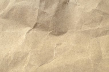 Arkaplan için kahverengi buruşmuş kağıt dokusu.