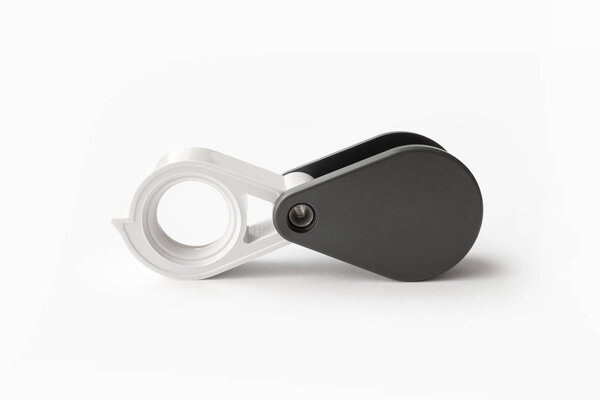 Magnifying glass for diamonds or see the amulet Isolated on a White Background. Eye Lens Magnifier.