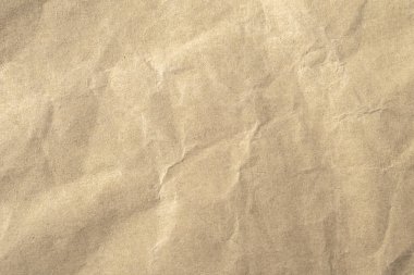 Arkaplan için kahverengi buruşmuş kağıt dokusu.
