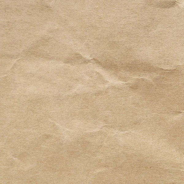 Brun skrynkligt papper textur bakgrund. — Stockfoto