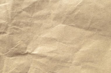 Arka planlar için kahverengi buruşuk kağıt dokusu.