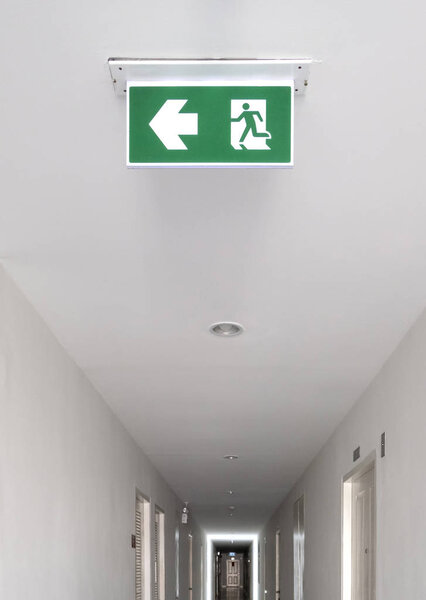 Fire exit sign. Emergency fire exit door exit door on ceiling.