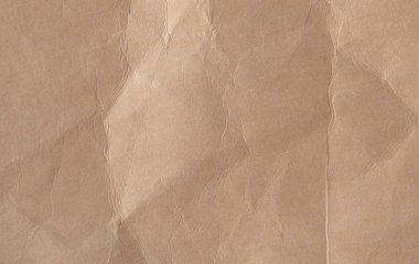Arkaplan için kahverengi buruşmuş kağıt dokusu.