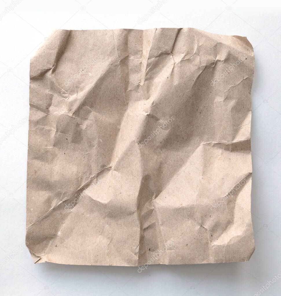 Brown wrinkle recycle paper background. Crumpled brown paper on white background, can use text banners products or business cards.