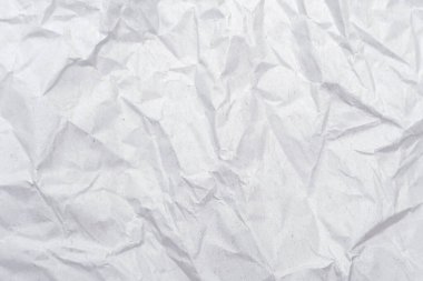 Beyaz buruşmuş kağıt dokusu. Arkaplan için soyut kağıt deseni. Resmi kapat..