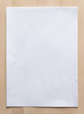 İş geçmişi için tahta üzerine beyaz kağıt çarşaf. Resmi kapat.