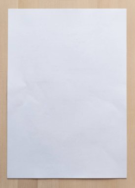 İş geçmişi için tahta üzerine beyaz kağıt çarşaf. Resmi kapat.