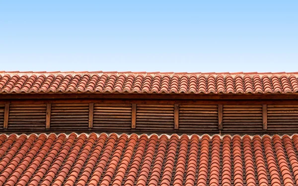 Red tile rooftop, closeup background.