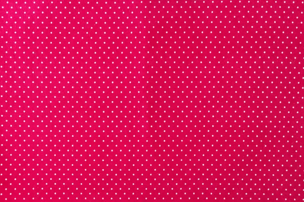 Vermelho e branco pequeno polka dot clássico tecido closeup, fundo limpo . — Fotografia de Stock