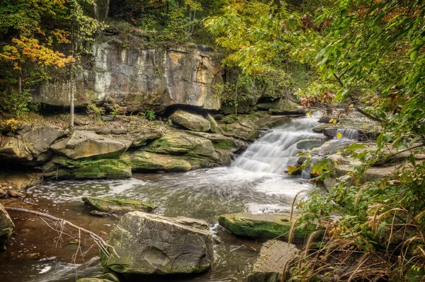 A small portion of Berea Falls Ohio during peak fall colors. This cascading waterfall looks it's best with peak autumn colors in the trees. 