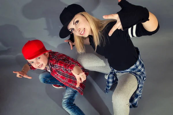 Mother and son dance hip-hop.Urban lifestyle. Hip-hop generation.