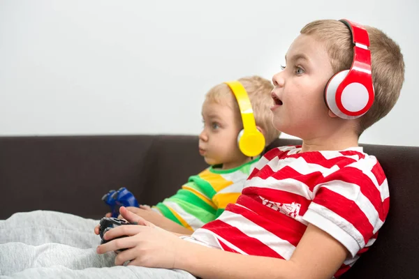 Two Brothers Playing Headphones Joysticks Video Games — Stock Photo, Image