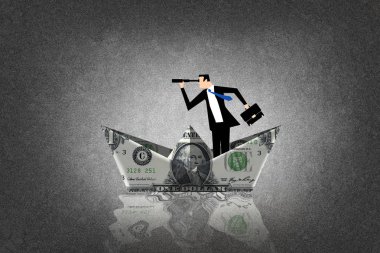 Adamın bir dolar ile yapılan bir tekne içinde