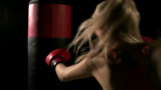 Young Intense Woman Throwing Punches Punching Sand Bag Resting White — Stock Video