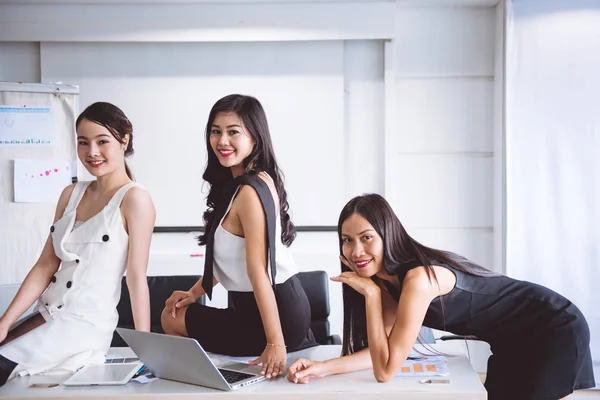 Woman leadership concept. Young asian woman in business dress pose in office looking confident. Confident business woman career path concept.