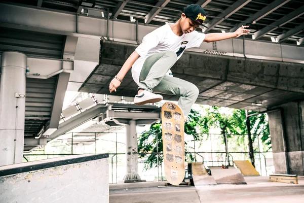 Skateboarder Action Asian Boy Urban Skateboard Park Bridge Doing Trick — Stock Photo, Image