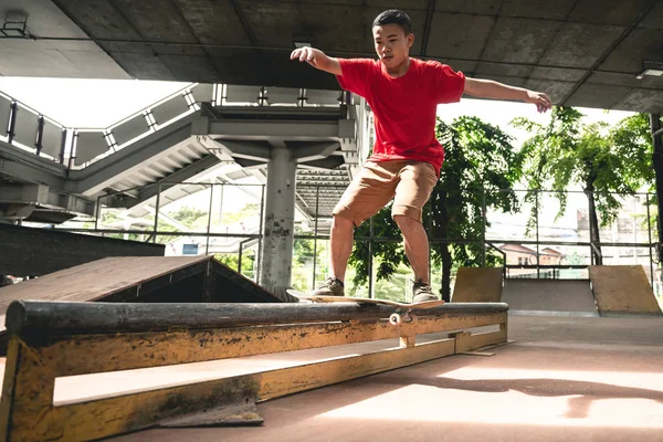 Skateboarder Action Asian Boy Urban Skateboard Park Bridge Doing Trick — Stock Photo, Image