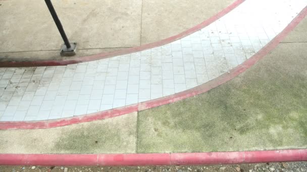 Two Asian Teenagers Riding Skateboards Indoors Greeting — Stock Video