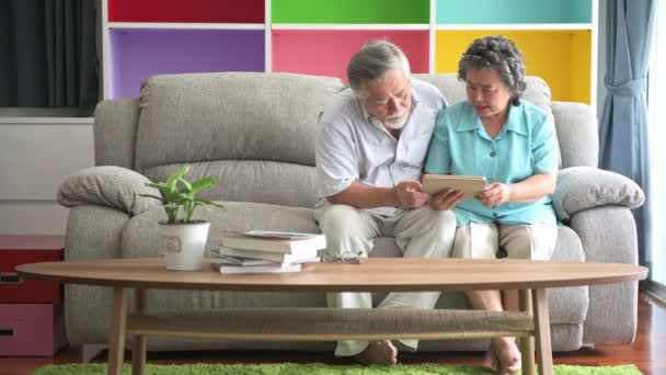 Senior Couple Sitting Watching Tablet Living Room Retired Old Asian — Stock Video